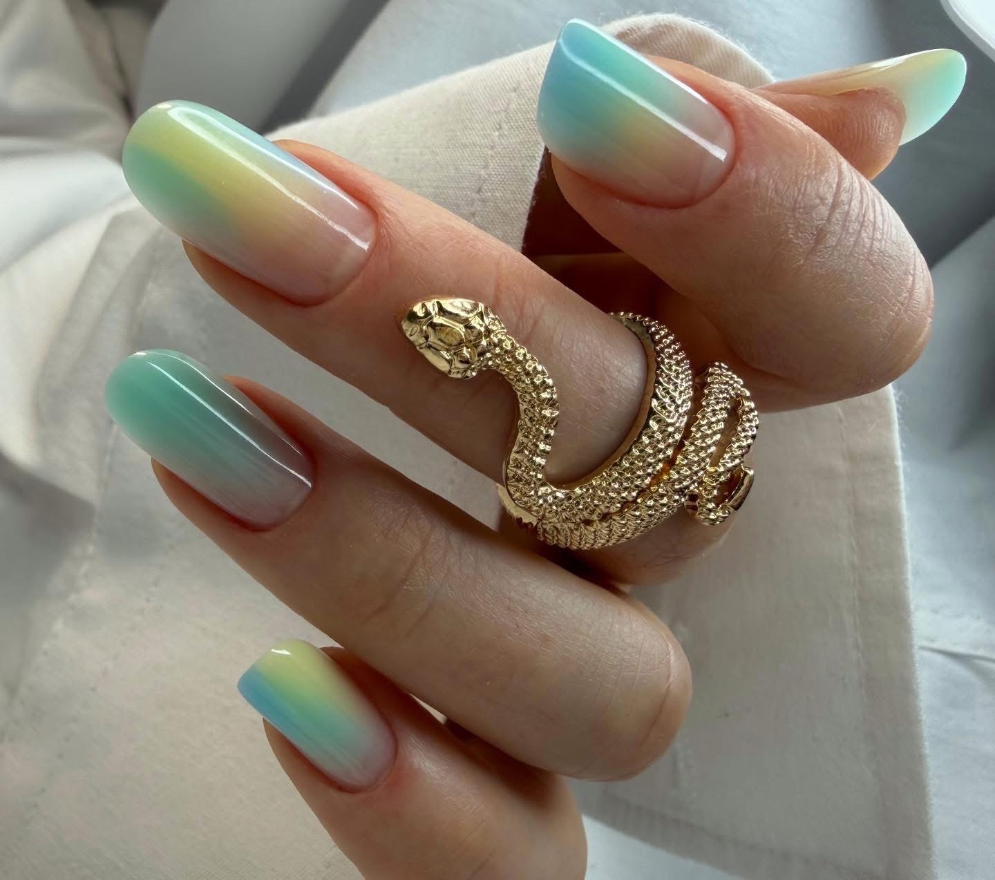 Clean babyboomer gel nails with a smooth natural pink and white ombre gradient.