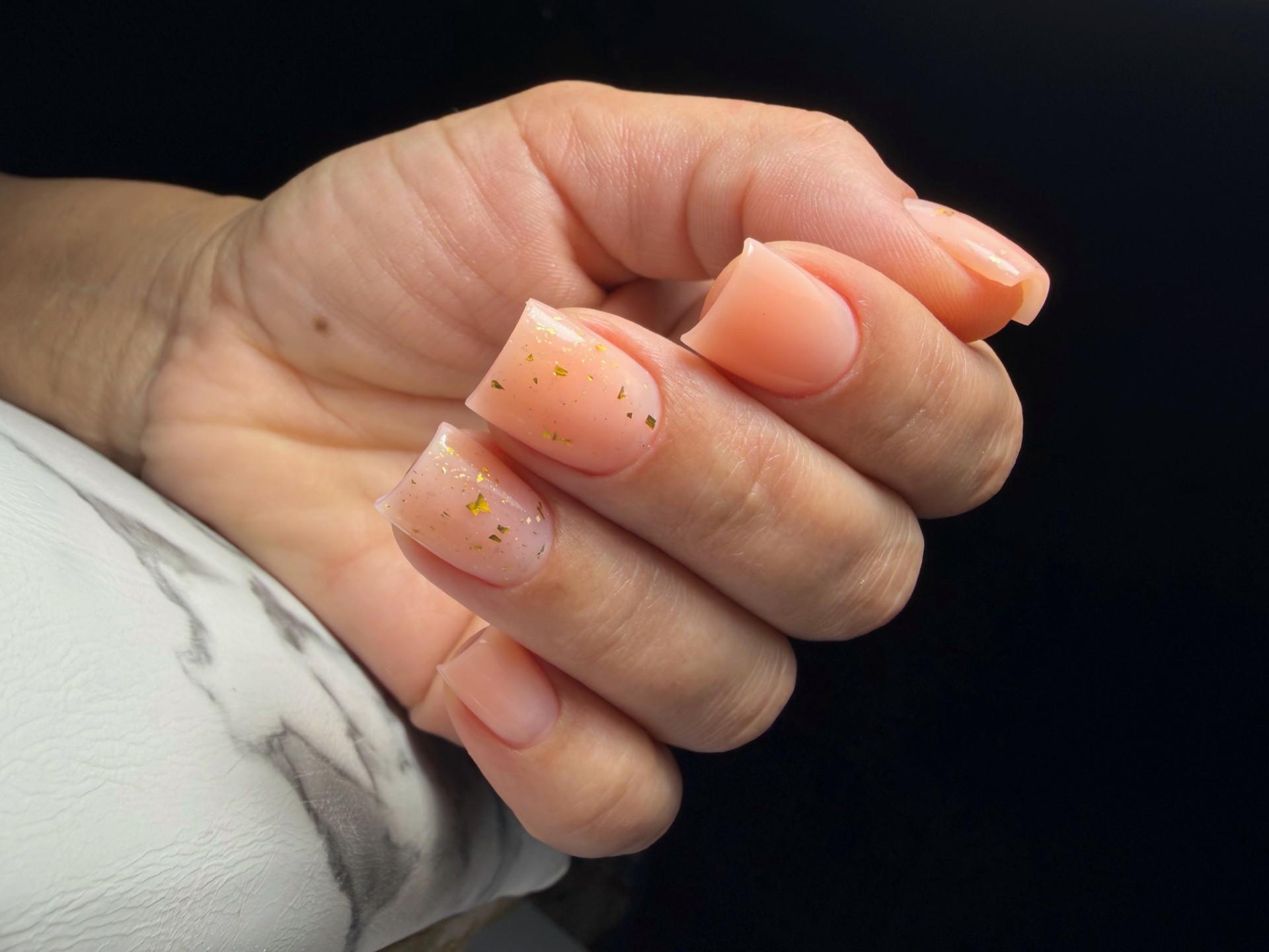 Contemporary geometric nail art featuring hand-painted abstract lines on pastel gel base.