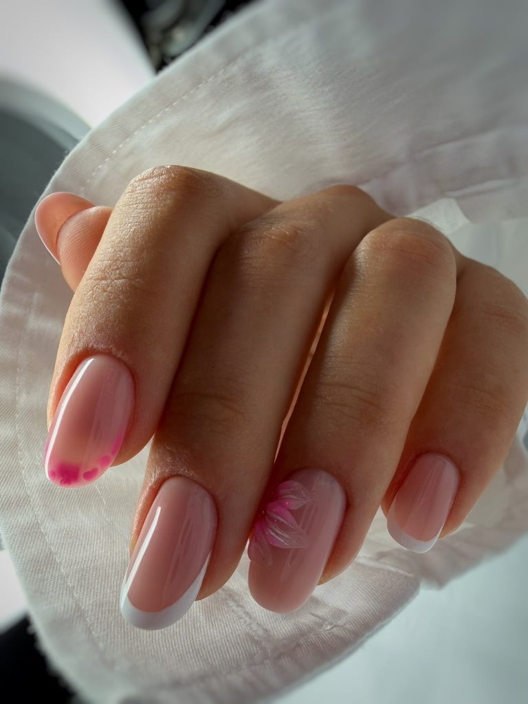 Elegant classic red gel nails with a glossy finish in a clean almond shape.
